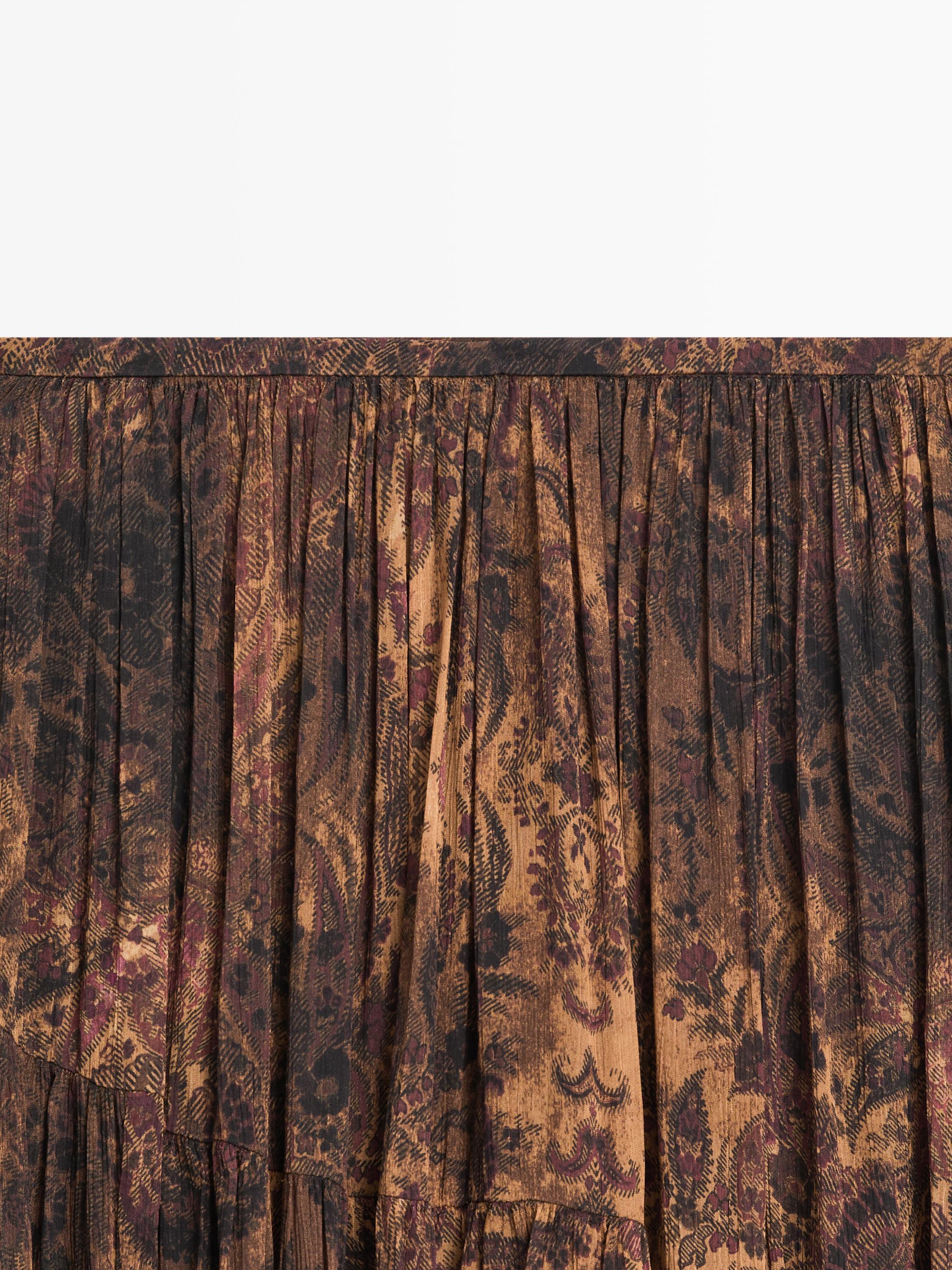 Flowing asymmetric midi skirt